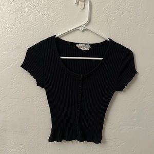 Tight t-shirt, flattering.